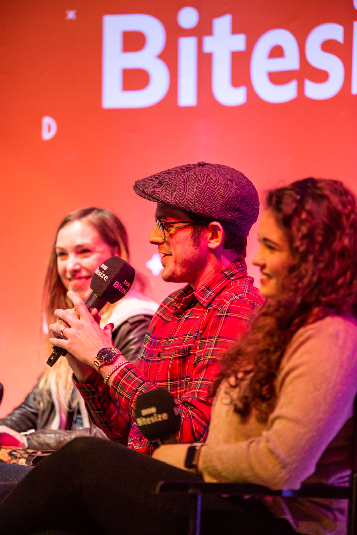 Dan answering questions with fellow panel members