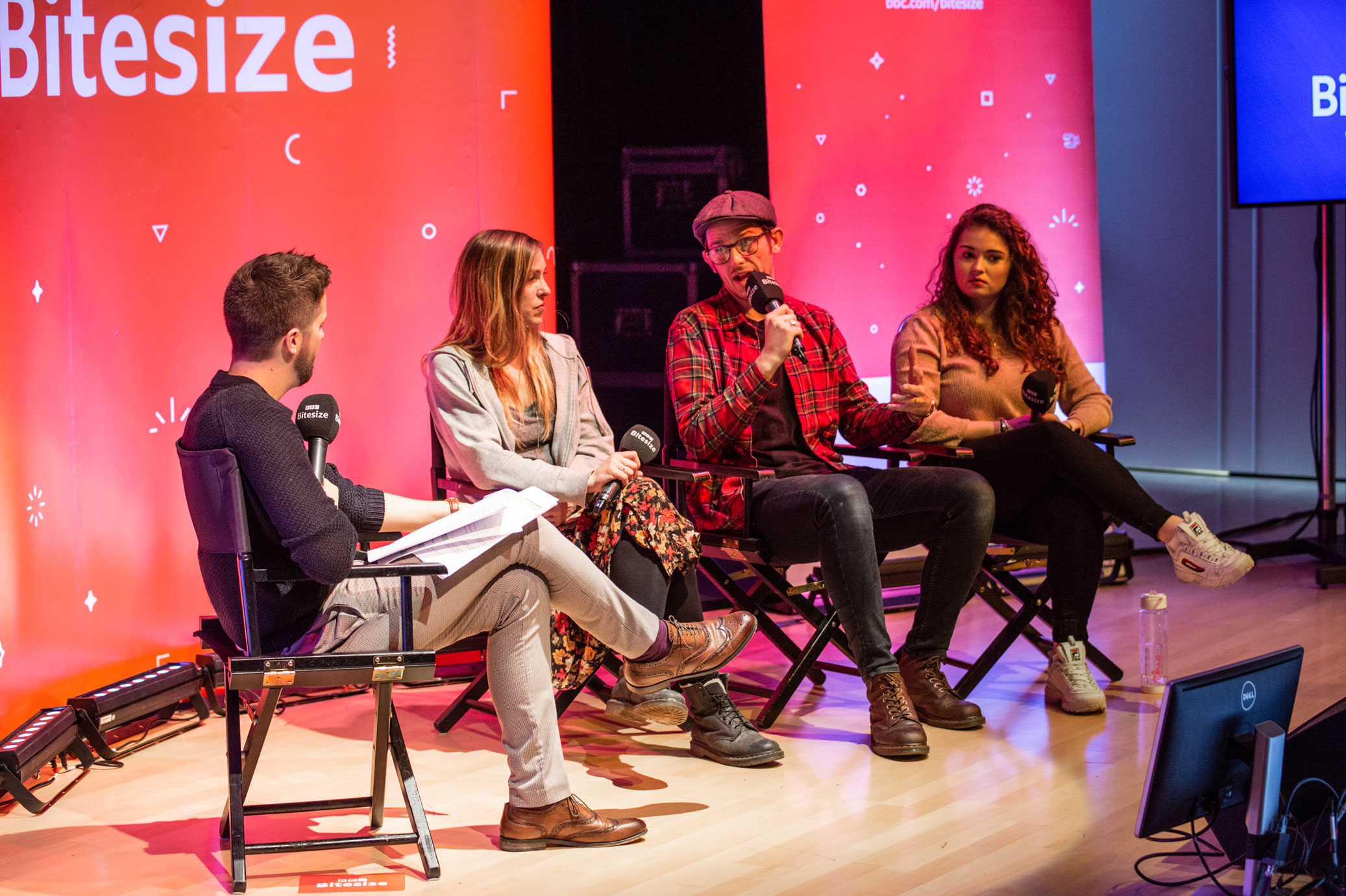 Dan answering questions with fellow panel members